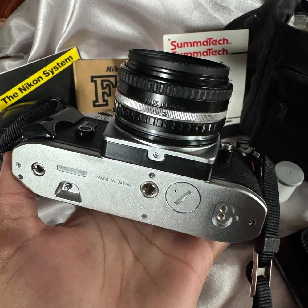 FG Nikon 35mm SLR camera with accessories